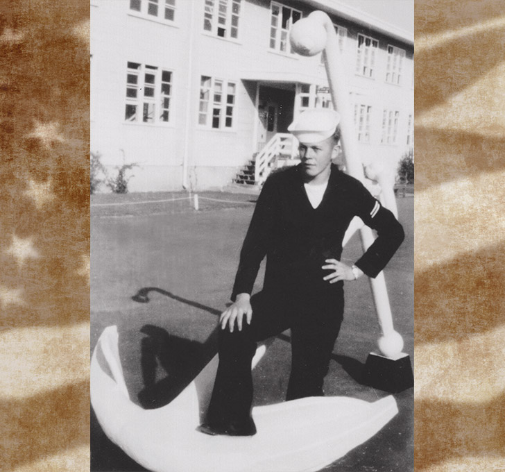 Tulalip Veterans Alexander Warren Sr., posing by ship anchor.